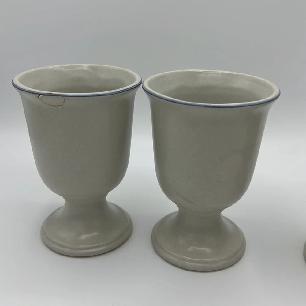 CREAM AND BLUE STONEWEAR DRINKING MUGS AND PITCHER